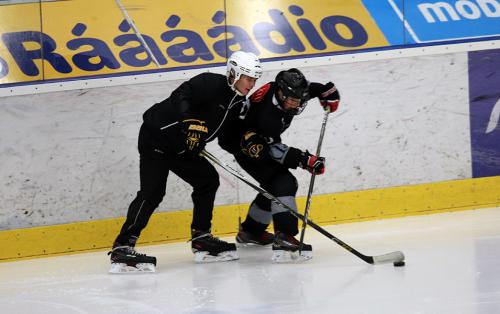 Coach David Holub and #10 Jan Hamřík